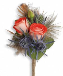 exotic mix of blue eryngium and pheasant feathers