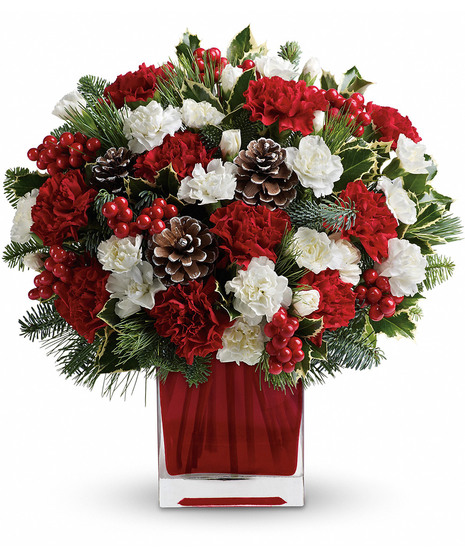 This sweet bouquet includes red carnations and white carnations beautifully arranged in our bright red glass cube.