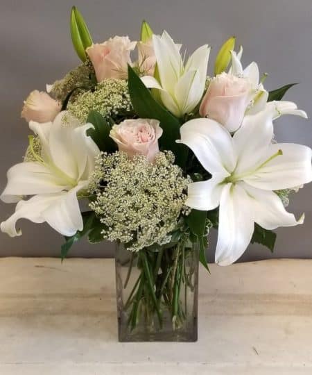 Heavenly hues and pretty petals are in perfect harmony in this gorgeous arrangement. Lovely for a birthday, anniversary or just because, it's simply stunning!
